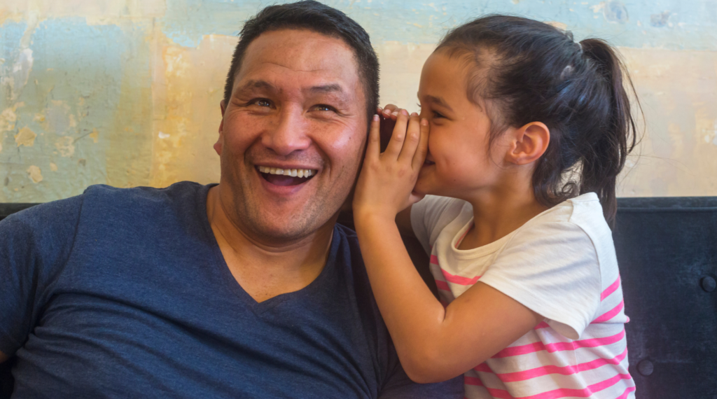 Father and daughter talking in Te Reo