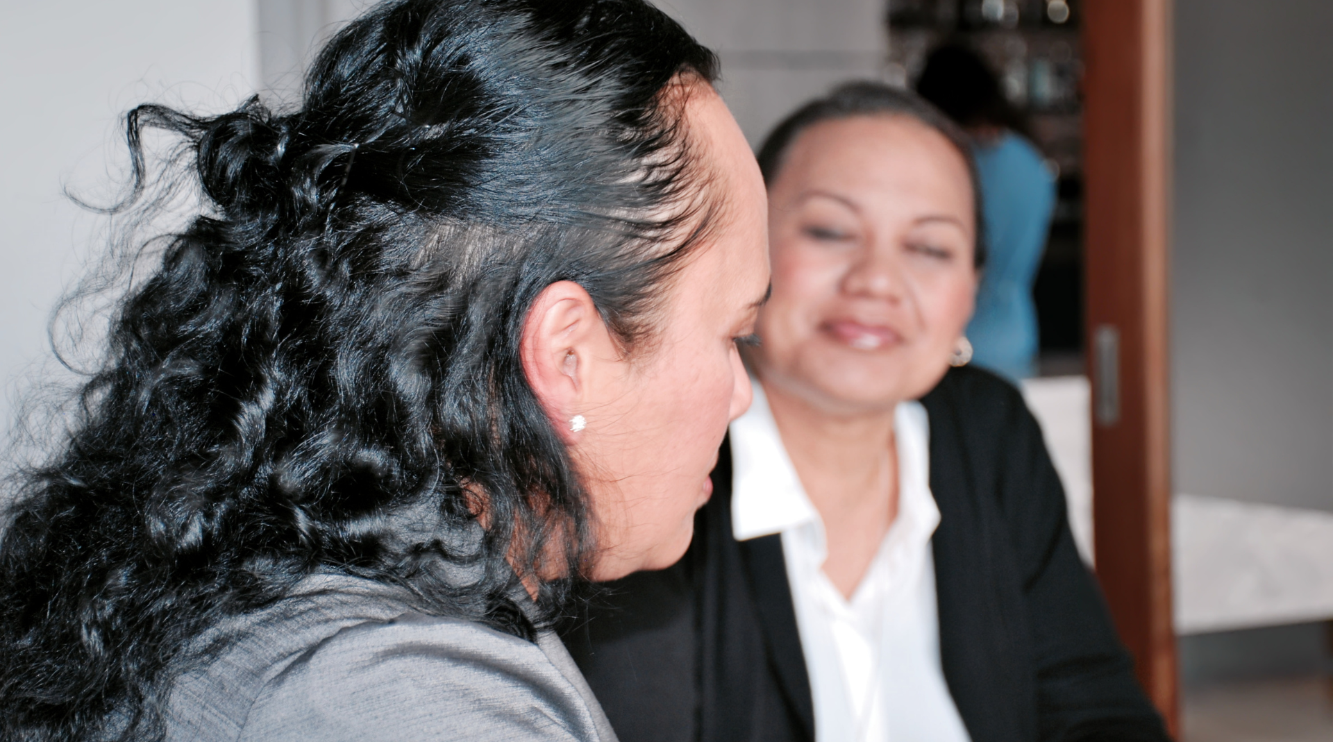 two ladies in conversation